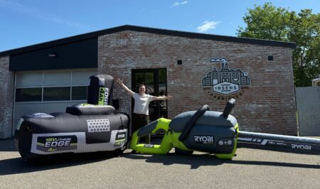 A 5-meter-long inflatable chainsaw and a 2-meter-high version of the battery and charger